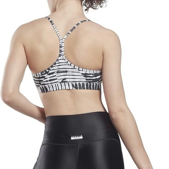 Reebok Women's Strappy Printed Light Support Sports Bra - Core 10
Collection - Picture 2 of 7